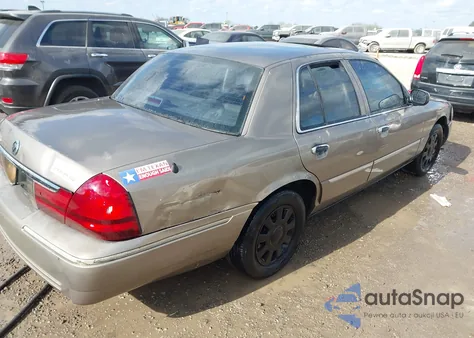 2005 Mercury Grand Marquis из США, поврежденный, VIN 2MHFM75W35X647751